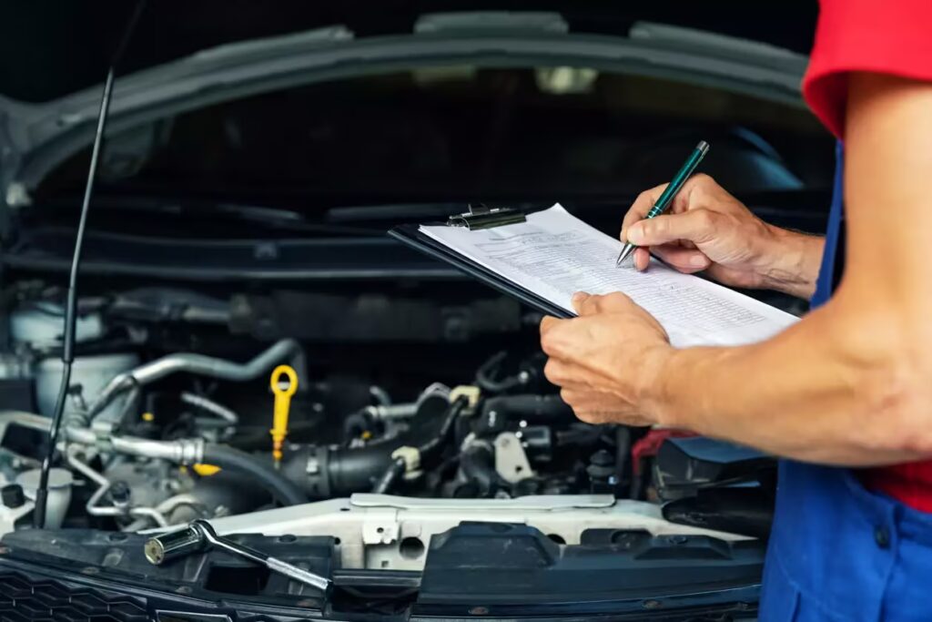 Mechanic performing pre-purchase vehicle inspection in Brisbane